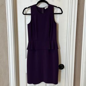 Purple dress with peplum detail